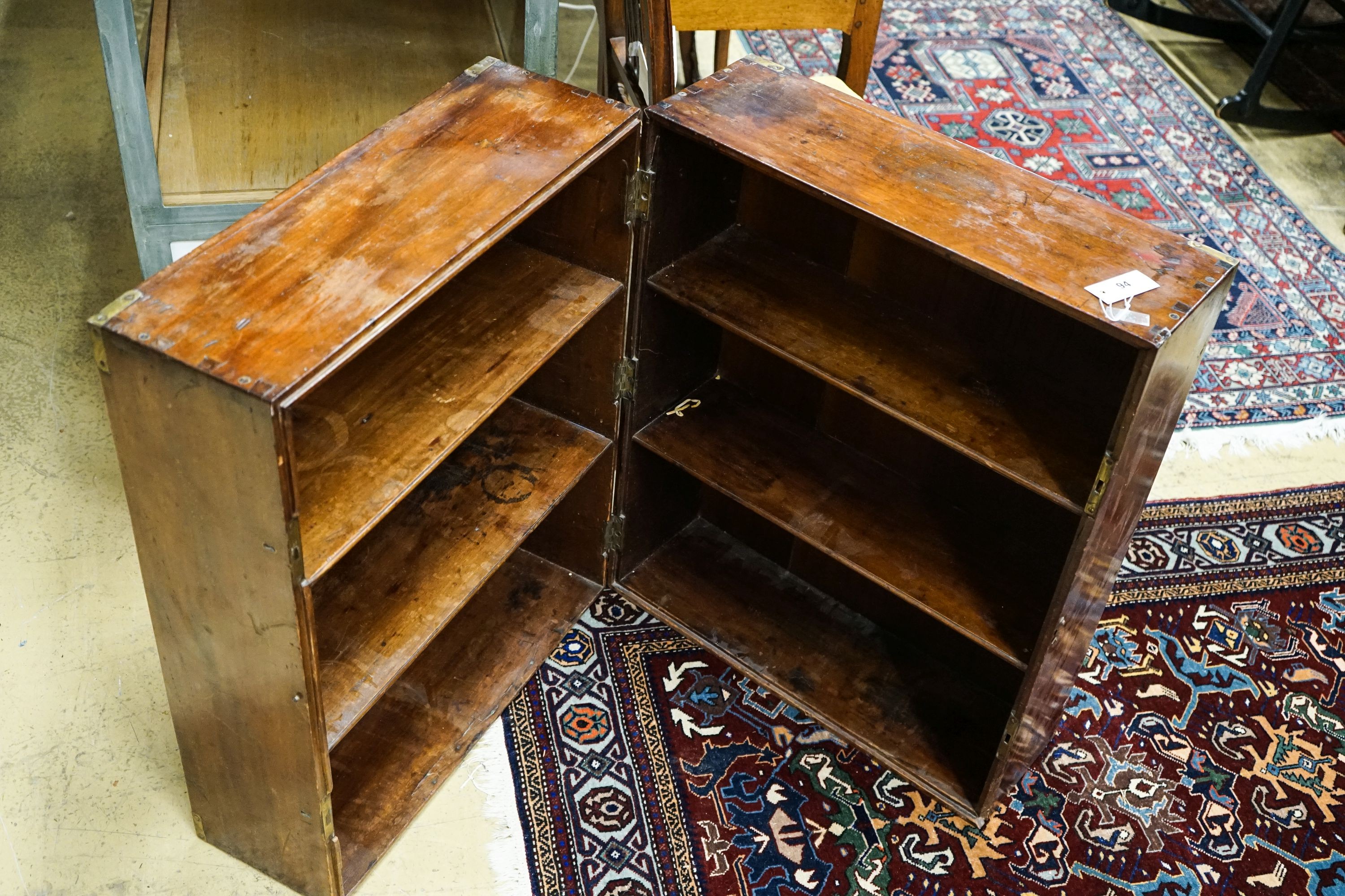 A 19th century brass mounted mahogany campaign trunk with shelved interior, length 60cm, depth 40cm, height 74cm